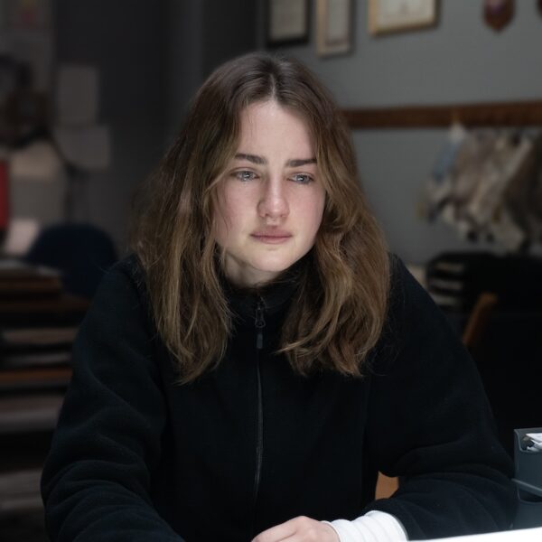 AmandaKnox GraceVanPatten.blacksweatshirt sitting